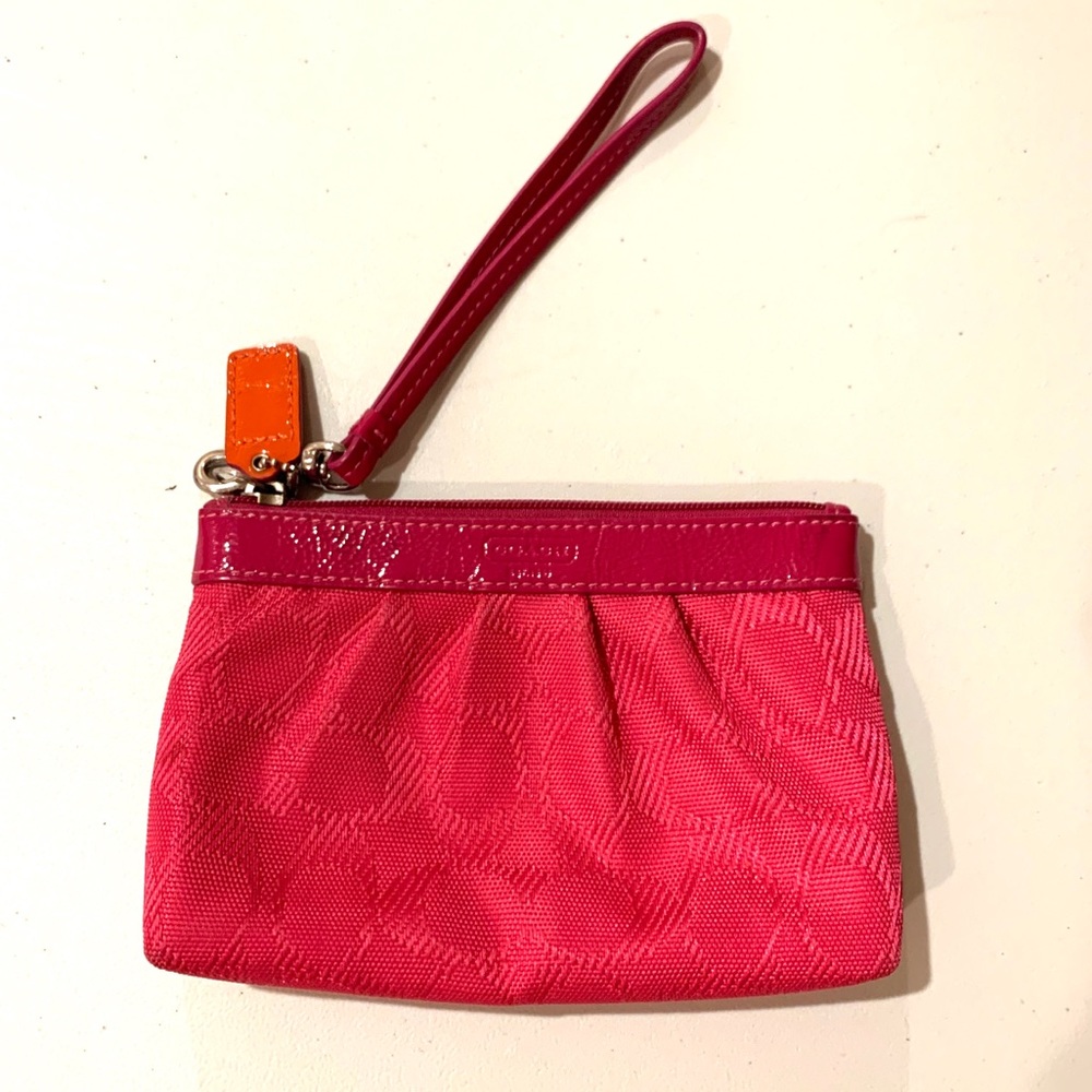 Pink coach wristlet